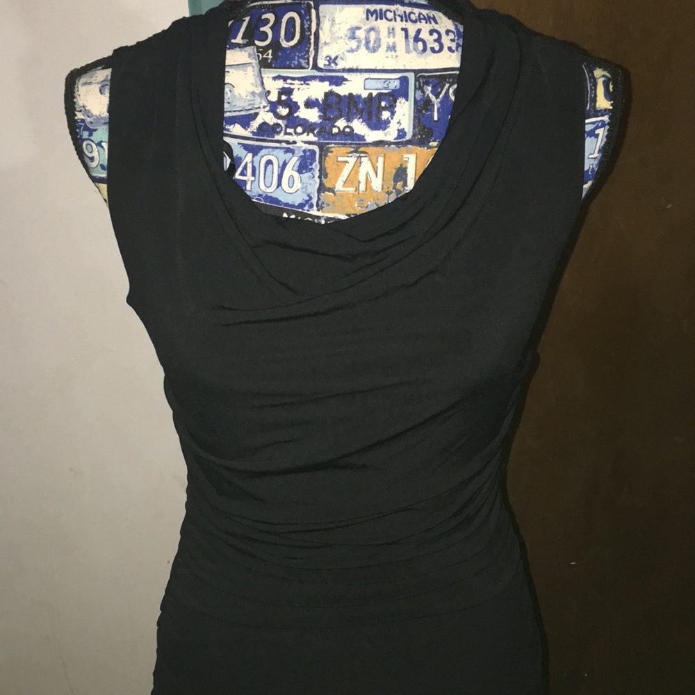 Mid length black dress with lace back